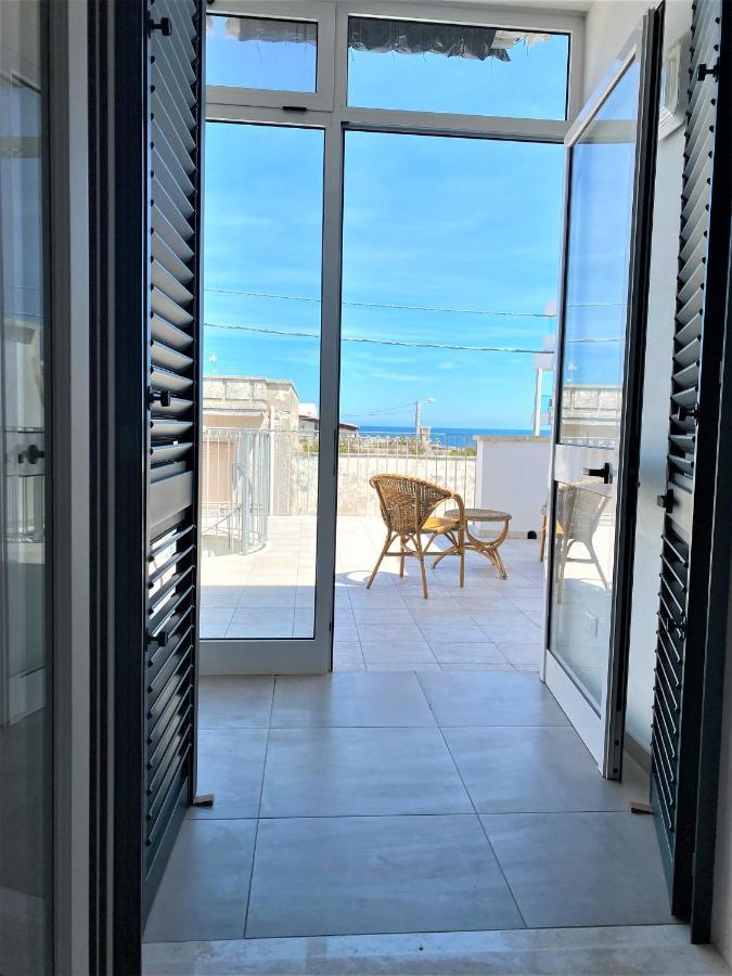 Attico Maestrale Villa Torre dell'Orso Luaran gambar